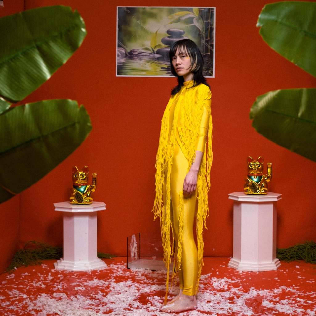 Artist and singer Kuoko on set for Hiền Hoáng's work "Made in Rice", photography by Julia Gaes.