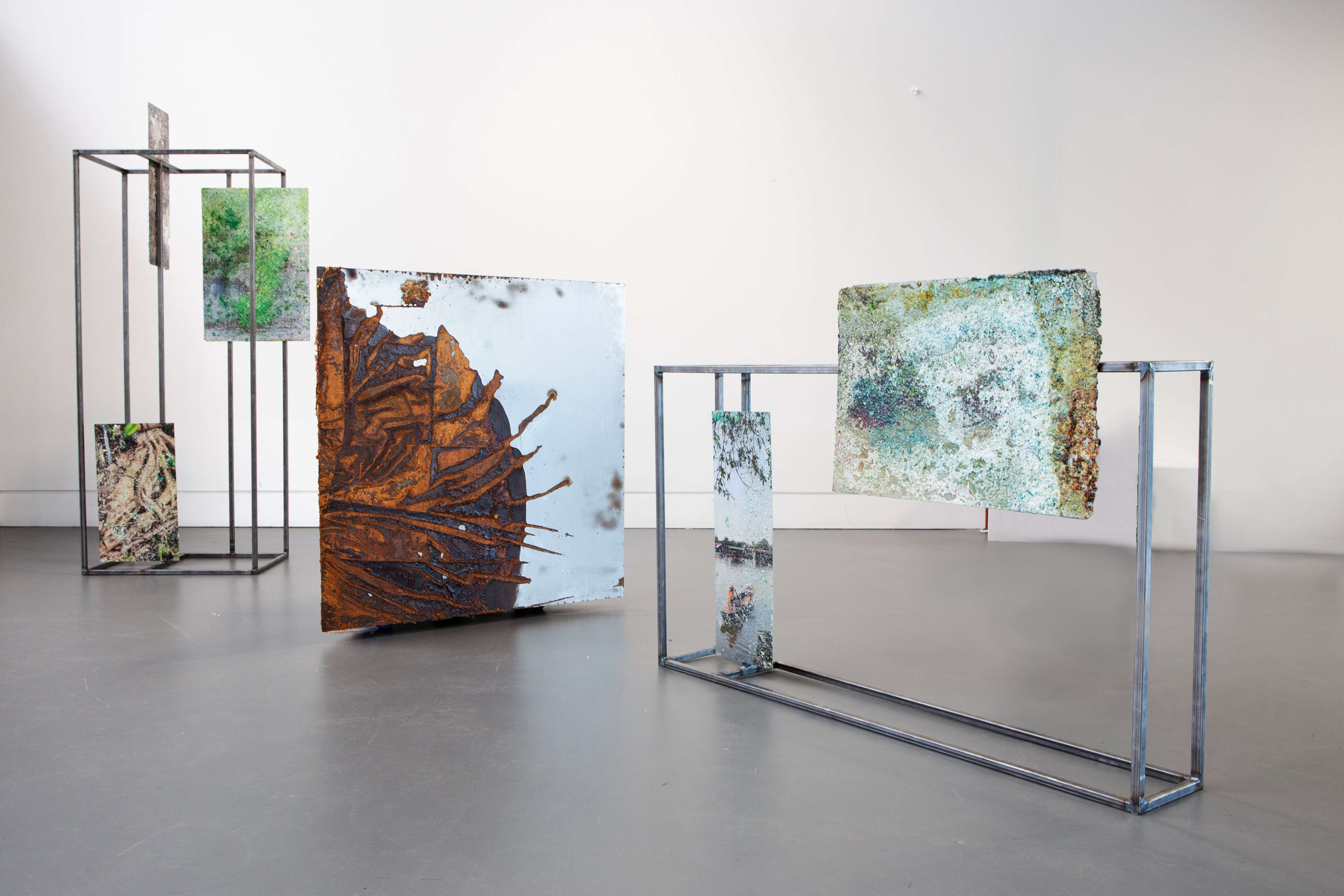 Hiền Hoàng, How to Touch the Elephant (2026–ongoing), 2026 version, consisting of constellations of corroded UV prints and sculpture, variable in items and dimensions.