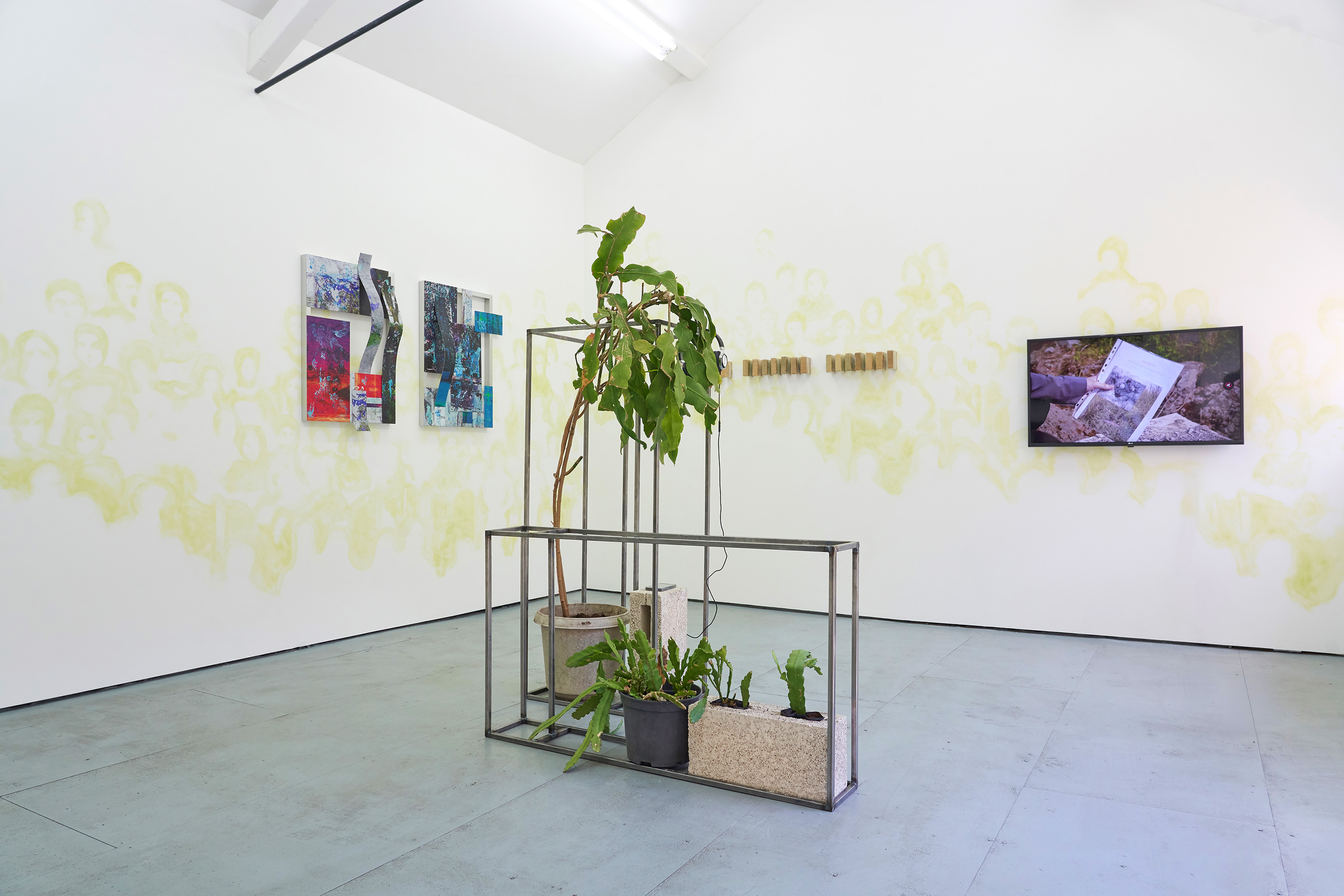 No Place Like Home III, installation view, with works by Hiền Hoàng (left), Alvin Luong (video, right), Hoa Dung Clerget (middle, in collaboration with Hien Hoang), and KV Duong (mural on the wall), SLQS Gallery, London, 2026. Photo by Joanna Wierzbicka.