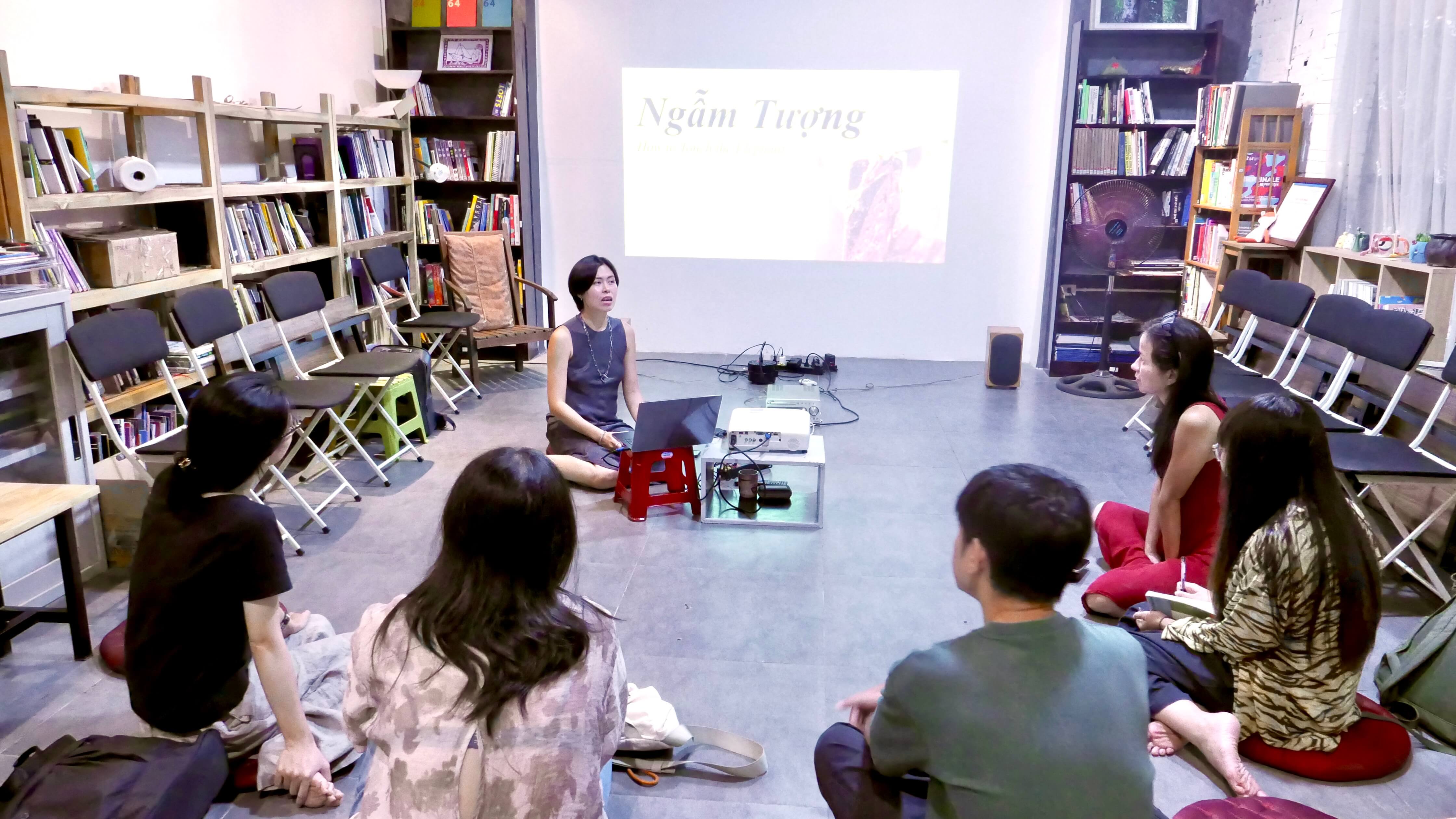 Hiền Hoàng at the reading performance presenting Ngẫm Tượng - How to Touch the Elephant at the Heritage Art Space Hanoi, Vietnam.